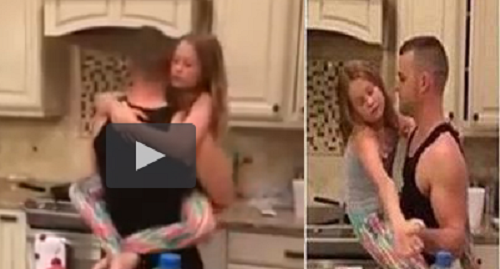 Tan chảy với hình ảnh cha bế con gái trên tay và nhảy những điệu nhẹ nhàng