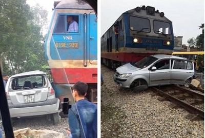Cắt đầu tàu hỏa, ô tô bị kéo lê 20m