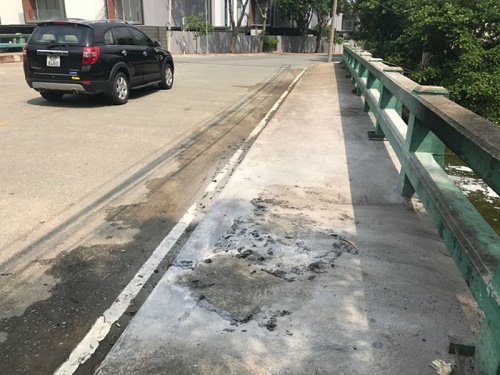 Nghi án 2 anh em ruột cùng tẩm xăng tự thiêu trên cầu Sài Gòn