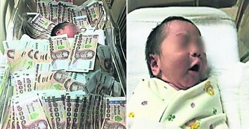 Bức ảnh em bé “chôn” trong đống tiền bị dân mạng “ném đá” tơi bời