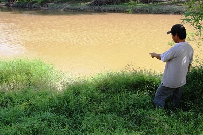 Khởi tố gã hàng xóm dụ bé gái ra đồi cát  giở trò đồi bại rồi ném xuống sông