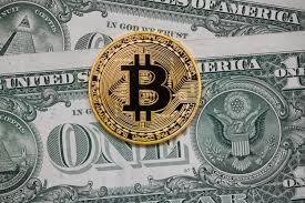 Giá bitcoin về dưới 6.000 USD sau khi