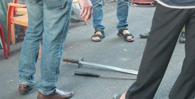 Bắt nghi phạm chém chết bạn nhậu vì bị chửi 