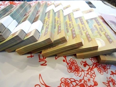 Đổi tiền lẻ, tiền mới tại chợ đen bị hét giá 