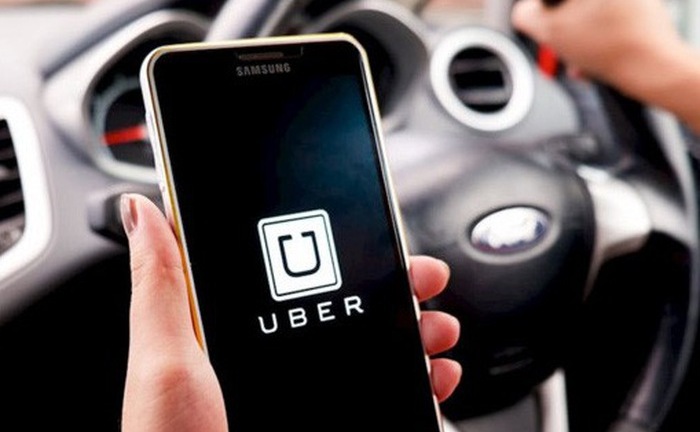 Uber, Grab và một năm “làm mưa  gió” thị trường taxi Việt Nam