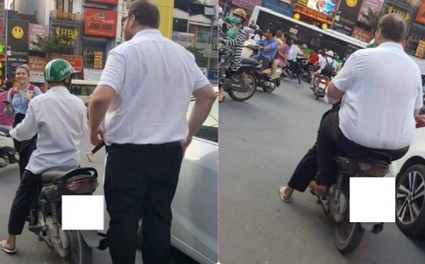 Hình ảnh hài hước: Tài xế Grab nhỏ bé chở người đàn ông ngoại quốc trên phố