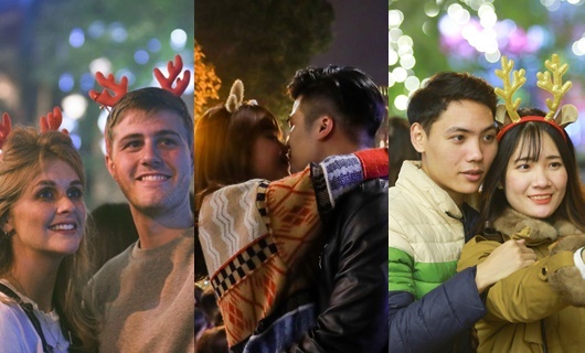 Trai xinh gái đẹp trao nhau nụ hôn ngọt ngào khi ra đường đi chơi lễ Giáng sinh