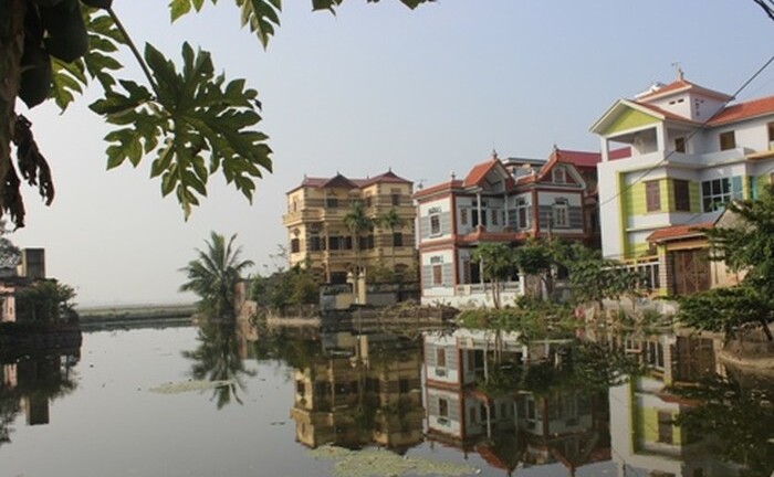 Buôn thịt lợn, cả làng thành tỷ phú, biệt thự mọc lên san sát 