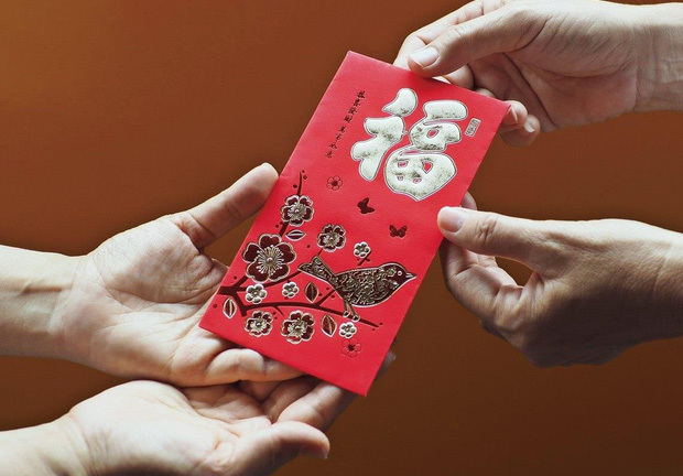Tục lì xì đầu năm mới Tân Sửu: Vì sao nên đặt trong phong bao màu đỏ?