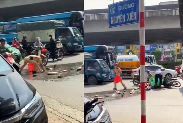CSGT Hà Nội giúp người dân nhặt hơn 1 tạ cá bị đổ giữa đường