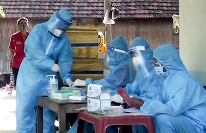 Tự mua dụng cụ test nhanh COVID-19, nữ tiểu thương bán thịt phát hiện dương tính SARS-CoV-2