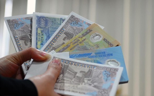 Đổi tiền lẻ lấy tiền chênh lệch kiếm lời dịp Tết Nhâm Dần 2022, bị phạt bao nhiêu?