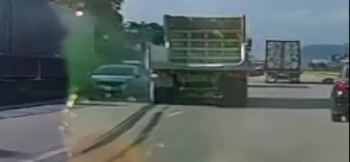 Video: Xe tải chuyển làn ẩu, húc ô tô con lao thẳng dải phân cách
