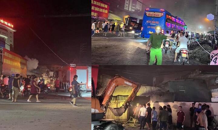 Cháy chợ Cẩm Phả, người dân dùng máy xúc phá tường để dập lửa