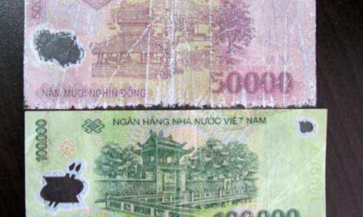 Đổi tiền rách ở đâu, có bị mất phí đổi hay không?