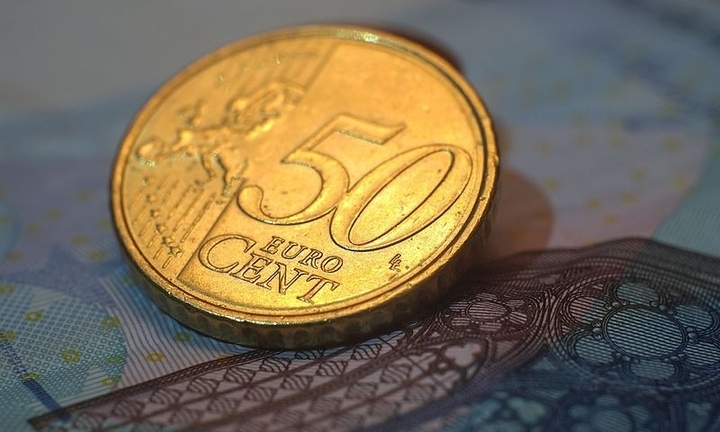 Đồng xu đúc bằng vàng có phải là vàng miếng không?