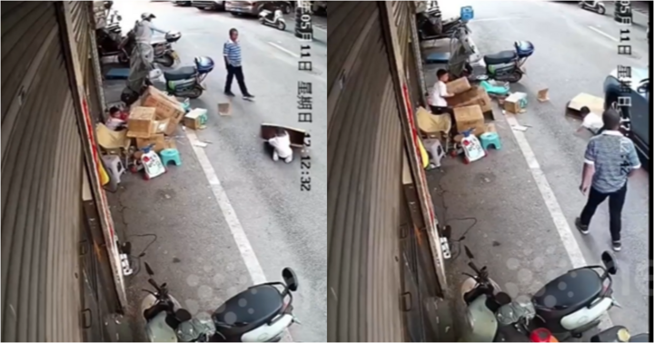 Clip: Trốn trong thùng carton giữa đường, bé trai bất ngờ bị ô tô cán ngay trước mặt bố
