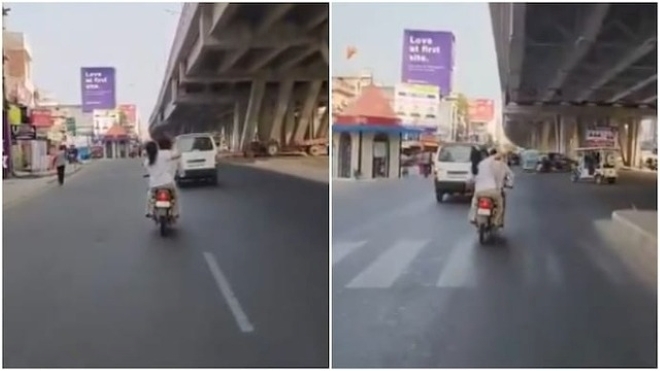Clip: Vợ ngồi sau xe máy, bất ngờ rút dép đánh chồng tới tấp gây bão mạng xã hội