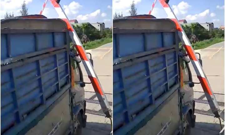 Xe tải tông đổ gác chắn tàu, rơi trúng người phụ nữ đi đường