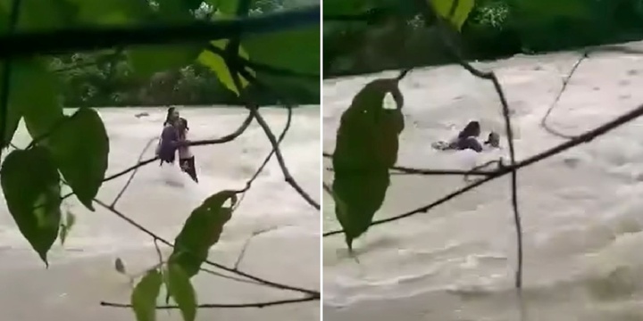 Clip: Hai học sinh bị lũ cuốn trôi khi băng qua sông để về nhà