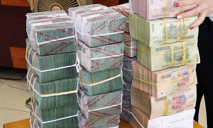 Đổi tiền lẻ dịp Tết để ăn chênh lệch có bị phạt không?