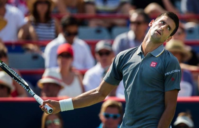Khoảnh khắc Rogers Cup: Serena đập nát vợt, Djokovic trút giận vào trái bóng
