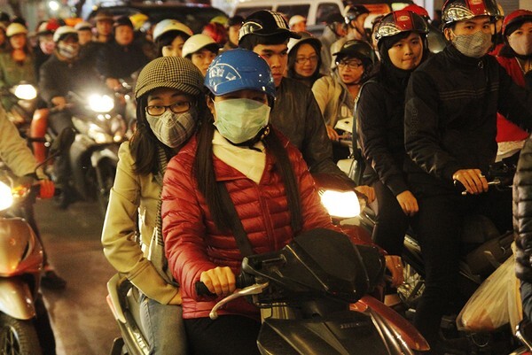 Chùm ảnh: Dân Hà Nội đón rét đầu đông