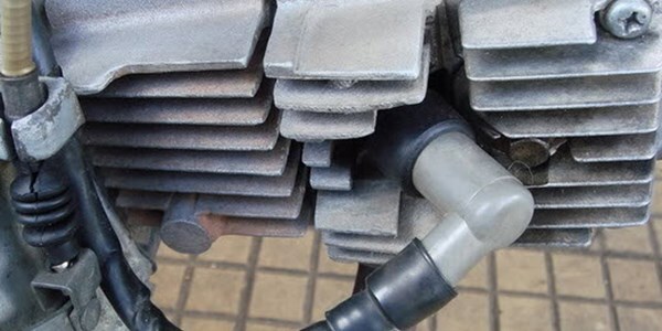 Xe máy hư bugi 55 ngàn, thợ ở TP.HCM đòi 1 triệu