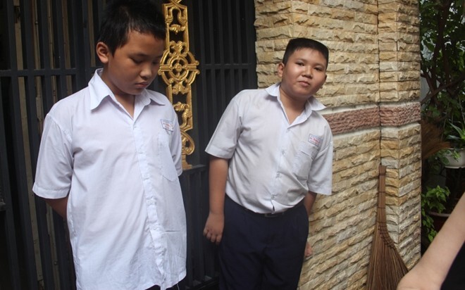 TP.HCM: Phá cửa cứu hai bé trai khóc thét trong căn nhà bốc cháy