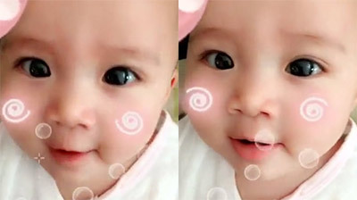 Em bé có đôi mắt tròn xoe hút hồn người xem