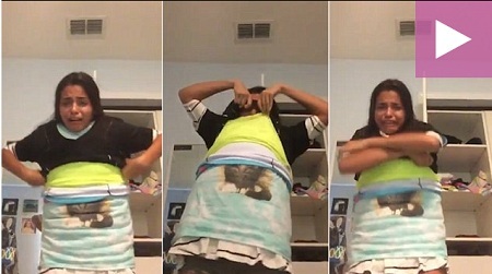 Cô gái “khóc thét” khi cởi 100 chiếc áo mặc trên người