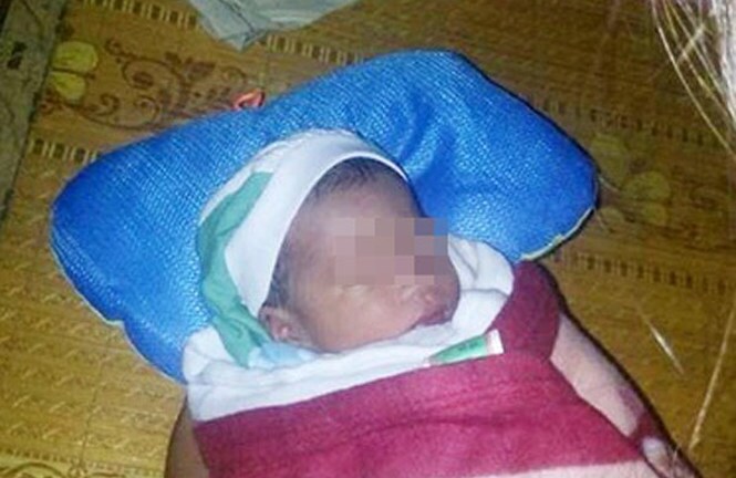 Bé trai sơ sinh bị bỏ rơi trong bão số 10