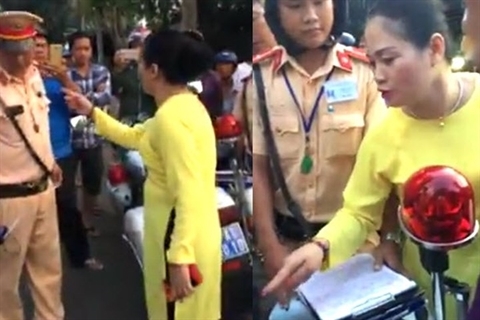 Đút lót 500.000 đồng không được, người phụ nữ lớn tiếng lăng mạ CSGT