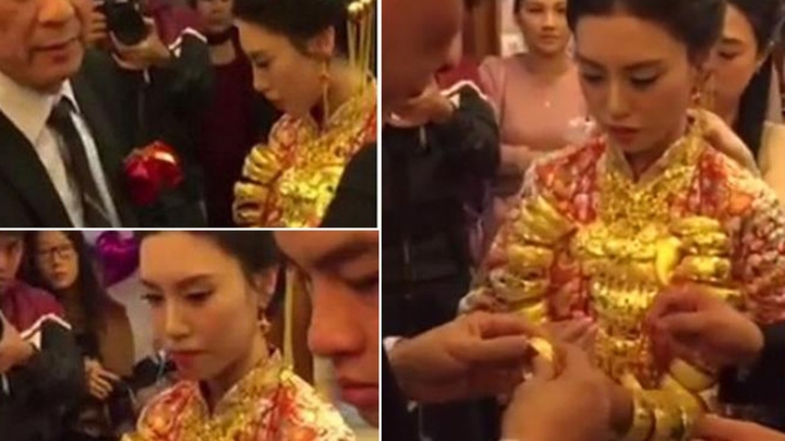 Video: Xôn xao cô dâu trẻ đeo 20kg trang sức vàng trong đám cưới