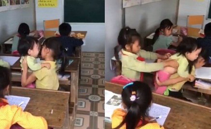 Cộng đồng mạng rơi nước mắt trước cảnh bé gái vừa ngồi học vừa trông em nhỏ