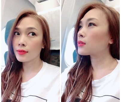 Hành động đáng yêu của Mỹ Tâm khi phát hiện bị chụp lén trên máy bay