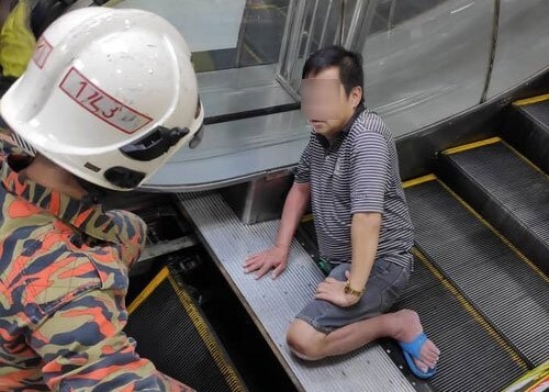 Malaysia: Xót xa người đàn ông bị thang cuốn 