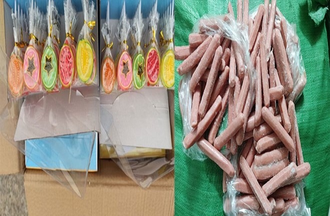 Thu giữ 1.500 hộp kẹo mút và 400 kg xúc xích không rõ nguồn gốc xuất xứ ở Lào Cai