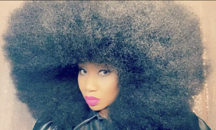 Người phụ nữ 3 lần lập kỷ lục thế giới với mái tóc xoăn xù cực đặc biệt