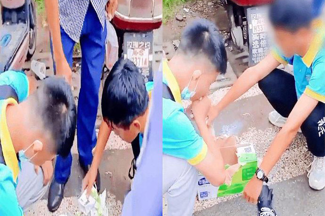 Hai nam sinh cố uống hết thùng sữa trước cổng trường, dân mạng lên án gay gắt nội quy vô lý