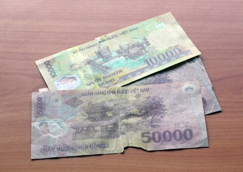 Tiền bị cháy có mang ra ngân hàng đổi được không?