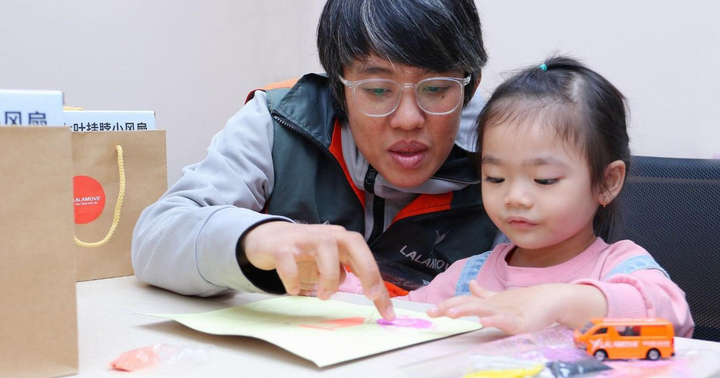 Đối tác tài xế Lalamove cùng gia đình tham dự sự kiện gặp gỡ nhân dịp Năm mới