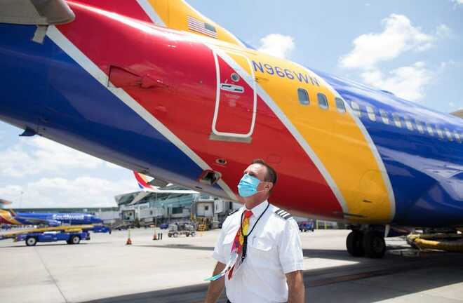 Bắt giữ nữ hành khách gây rối, đánh gãy răng tiếp viên hàng không