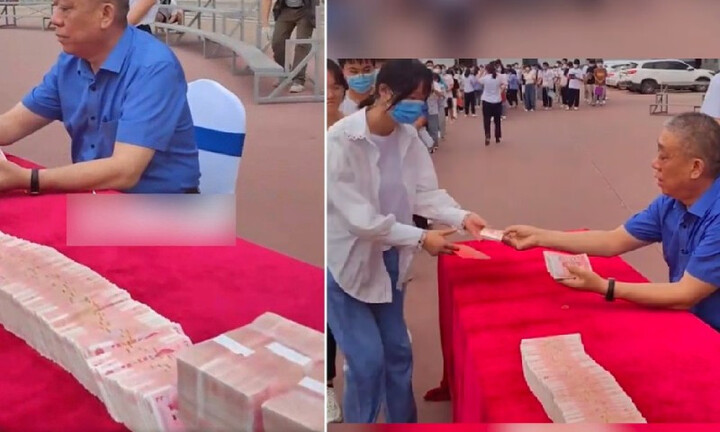 Đại gia Trung Quốc cầm xấp tiền phát cho sinh viên nghèo dịp khai giảng 