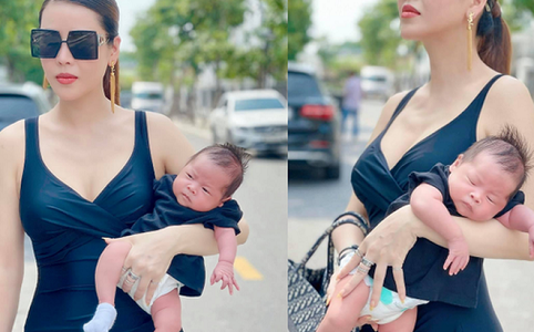 Quế Vân khoe ảnh bế con mới đầy tháng đi dạo phố, dân mạng tranh cãi vì điều gì?
