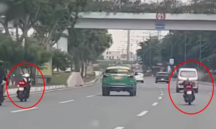 Xác minh clip 2 thanh niên “tổ lái” nằm dài trên xe máy, chạy vào làn ô tô