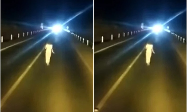 Tiết lộ bất ngờ về cô gái xõa tóc, mặc đồ trắng đi trên cao tốc Cam Lộ-La Sơn