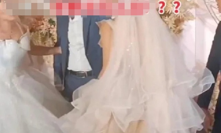 Chú rể ôm bạn gái cũ mặc váy cưới tiến vào lễ đường, cô dâu 