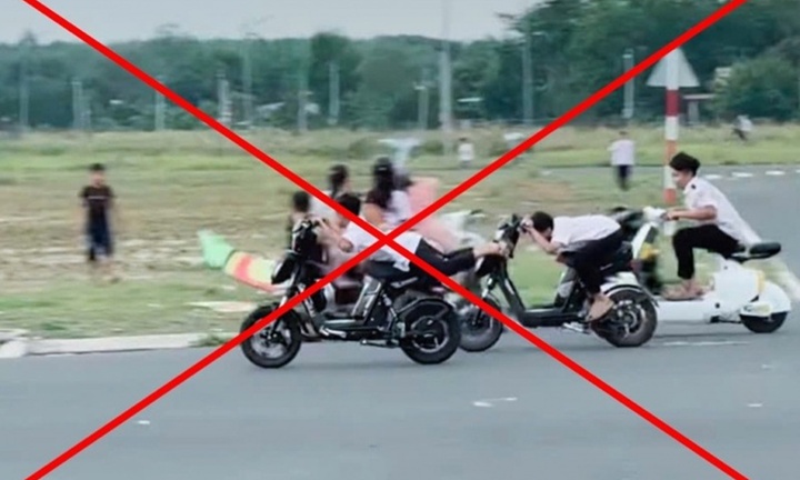 Xử lý nghiêm vụ học sinh lớp 6 đầu trần, nằm trên yên xe đi trên đường ở Bình Phước