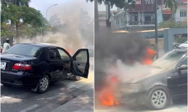 Vợ chồng sợ hãi mở tung cửa bỏ chạy khi phát hiện ô tô bốc cháy ngùn ngụt